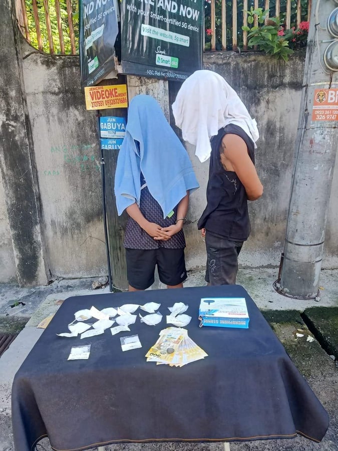 POLICE TO FILE RAPS AGAINST TEENER. A 17-year-old boy (with a blue towel) is rescued by the Cebu City police during a buy-bust operation in Barangay Punta Princesa in Cebu City on Saturday, November 6, 2021. His alleged 30-year-old cohort was also arrested. | Photo courtesy of CCPO-CIU