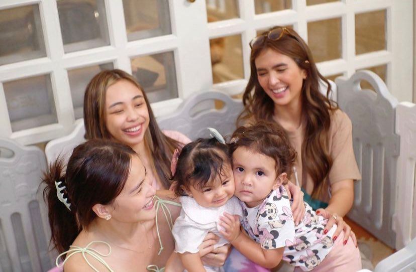 Baby Zoe and Baby Felize together with their mothers and friend.