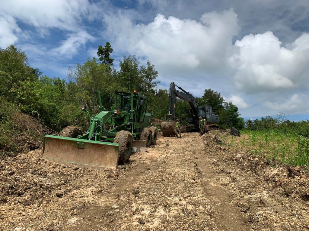 Heavy equipment of the 53rd Engineer Brigade are used to help in constructing this road linking two mountain barangays in Dumanjug, a town 78 km southwest from Cebu City. | Pegeen Maisie Sararaña