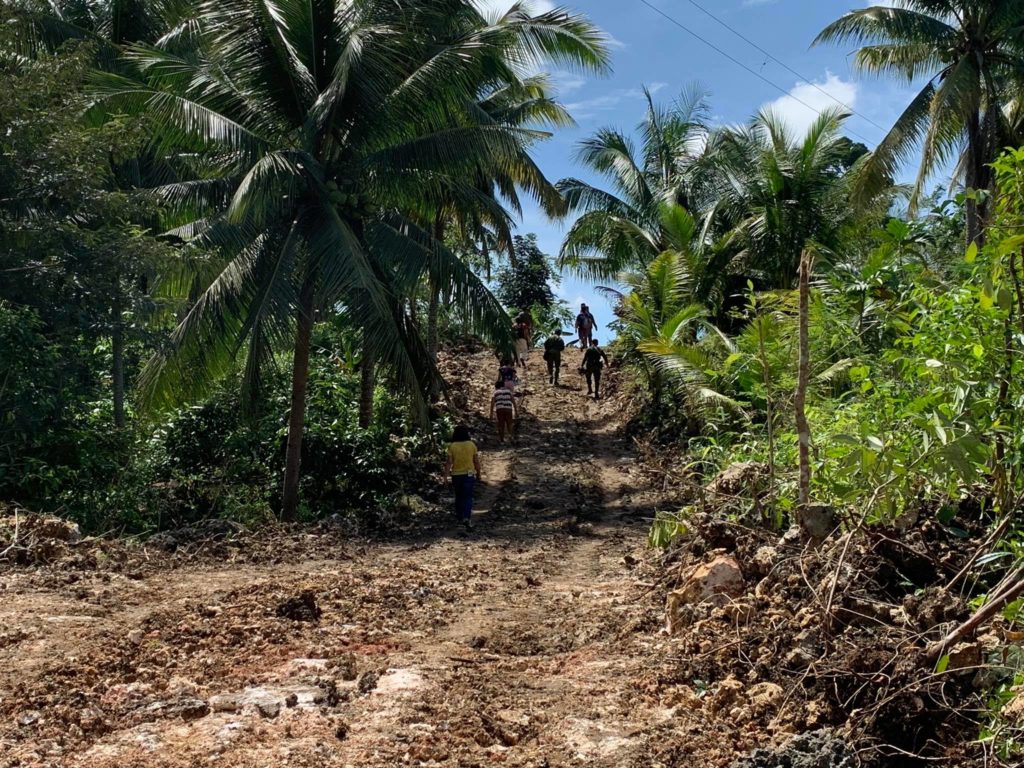 The newly opened road linking Barangay Cotcoton and Bulyogan in Dumanjug is expected to be completed by next year. | Pegeen Maisie Sararaña