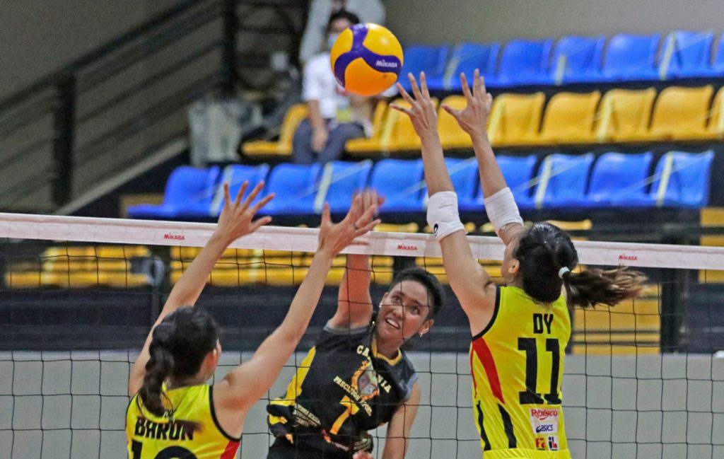 F2 LOGISTICS CARVE HARD EARNED VICTORY AGAINST CPS. F2's Majoy Baron (left) and Kim Kianna Dy (right) tries to block a spike from CPS's Jelai Gajero during their PNVF Champions League match. | Photo from PNVF