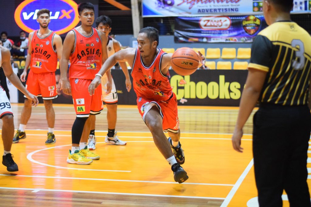 BASILAN PEACE RIDERS WIN IN VISMIN OPENER. Jan Carlo Luciano of Basilan dribbles the ball into position during their opening day match versus Iligan in the second conference of the VisMin Super Cup. | VisMin Cup Media Bureau