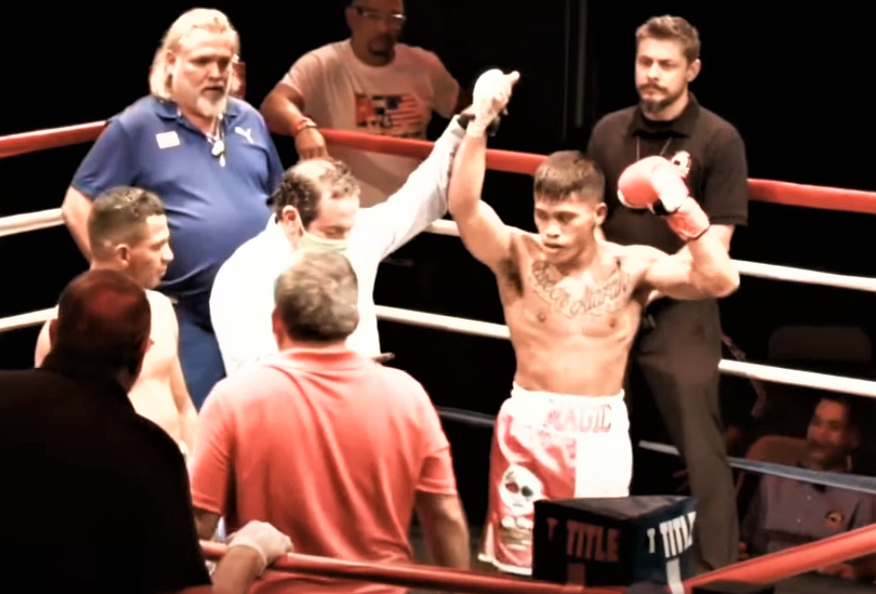 Mike Plania raises his hands after beating Ricardo Nuñez of Panama via first round TKO. | Screen grab from the fight's live streaming.