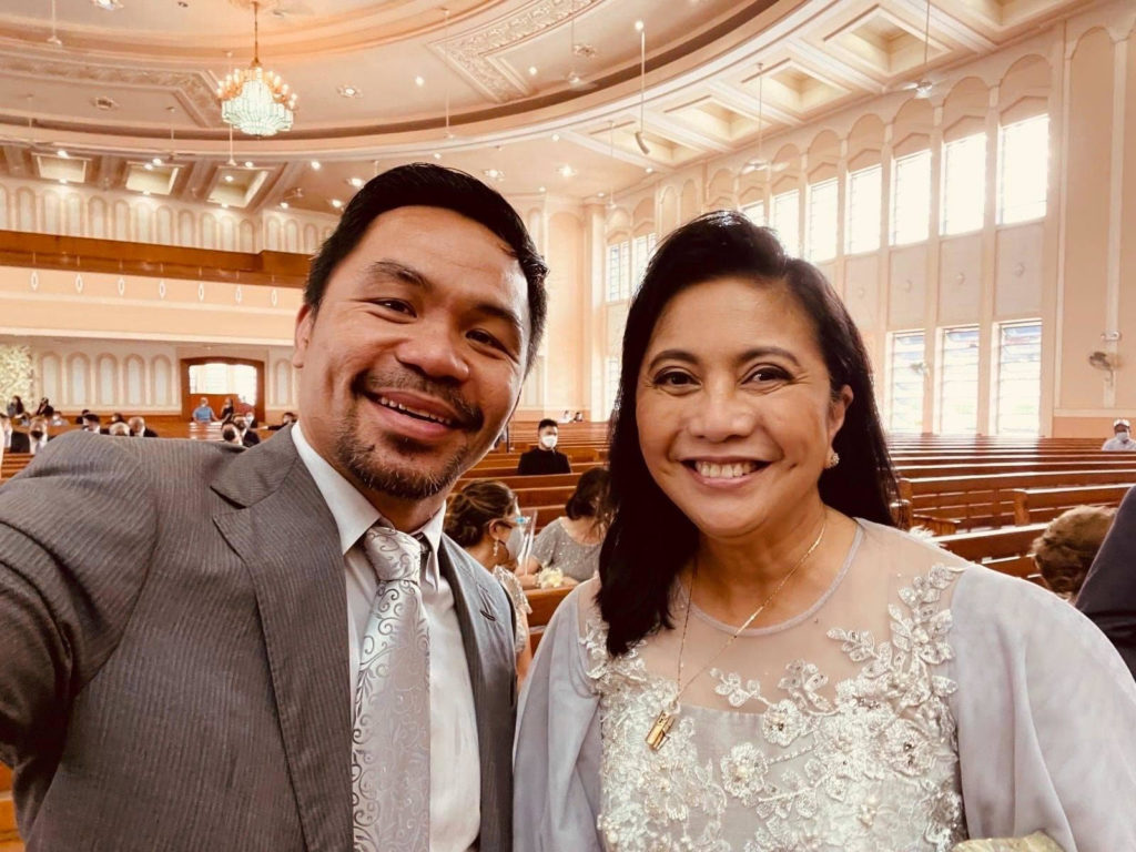 Pacquiao, Robredo sponsors of wedding in Cebu. In photo are presidential aspirants Senator Manny Pacquiao and Vice President Leni Robredo pose for a photo together at the church wedding.