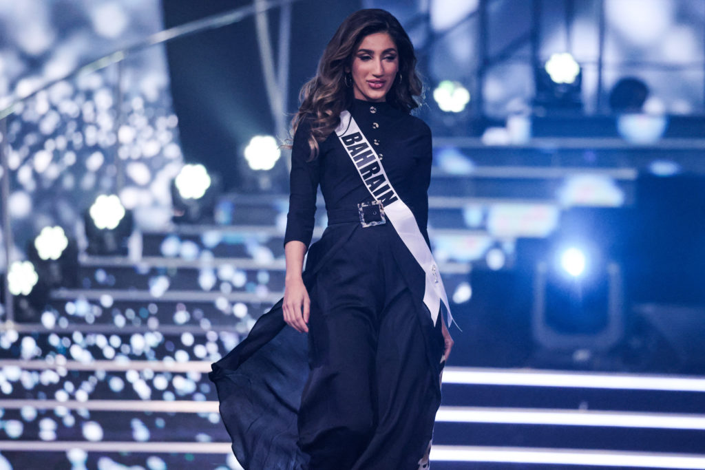 Miss Bahrain, Manar Nadeem Deyani, wears a black jumpsuit during the swimsuit competion, which is a part of the preliminary stage of the 70th Miss Universe beauty pageant in Israel's southern Red Sea coastal city of Eilat on December 10, 2021. (Photo by Menahem KAHANA / AFP)