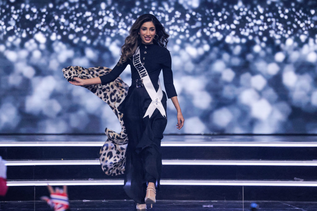 Miss Universe Bahrain Manar Nadeem Deyani, presents herself on stage during the preliminary stage of the 70th Miss Universe beauty pageant in Israel's southern Red Sea coastal city of Eilat on December 10, 2021. (Photo by Menahem KAHANA / AFP)
