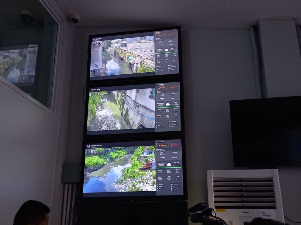 The City Disaster Risk Reduction Management Office personnel of Mandaue City will monitor the city's rivers and waterways with its "River Eye" cameras at the CDRRMO command center as part of the precautions for the possible upcoming storm that may affect the Visayas in the middle of the week. | Mary Rose Sagarino 