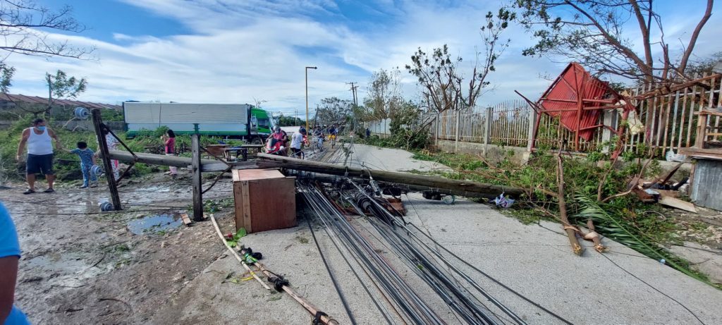 Electric posts toppled by typhoon Odette