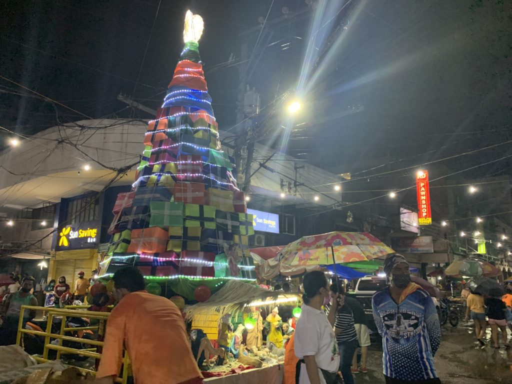 A Christmas tree stands in the city's biggest market. 