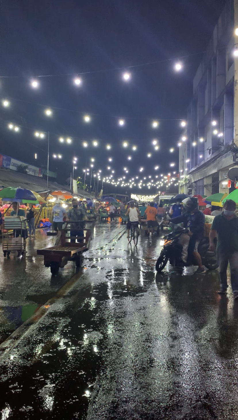 Vendors and customers continue with their businesses below the series of lights illuminating the line of stalls at the Carbon Market, a sign that Pasko sa Carbon has already started. | Delta Dyrecka Letigio