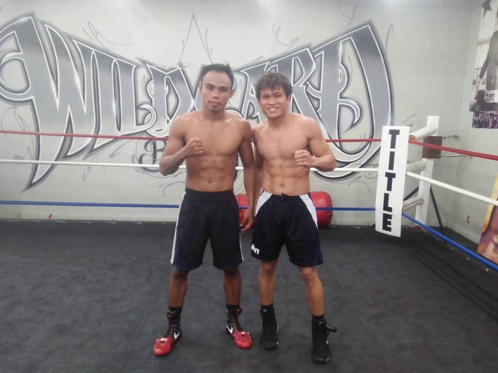 SANTISIMA BOUT MOVED. Jeo Santisima (left) and IBF world super flyweight champion Jerwin Ancajas (right) pose for the camera after their sparring session at the Wild Card Gym in Los Angeles. | Photo from Michael Domingo's Facebook page.
