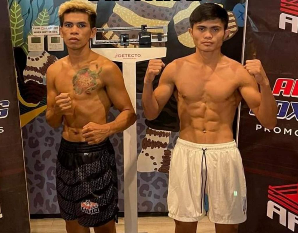 April Jay Abne (left) and Garen Diagan (right) during the official weigh-in of their first bout last December in Cebu City. | Photo from ARQ Sports Facebook Page