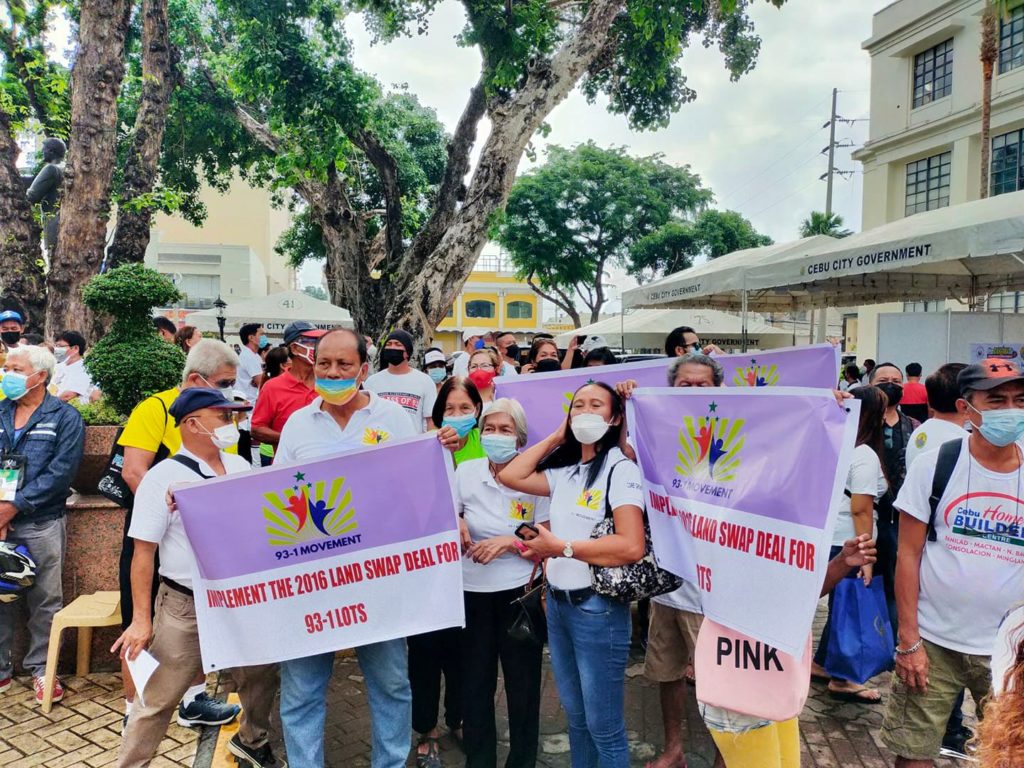 93-1 beneficiaries hold silent protest outside City Hall today, Cebu City's charter day. |Delta Dyrecka Letigio
