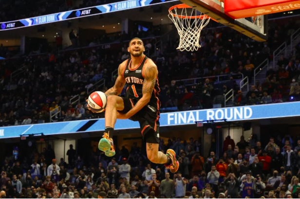 Obi Toppin #1 of the New York Knicks dunks the ball during the AT&amp;T Slam Dunk Contest as part of the 2022 NBA All Star Weekend at Rocket Mortgage Fieldhouse on February 19, 2022 in Cleveland, Ohio. Tim Nwachukwu/Getty Images/AFP
