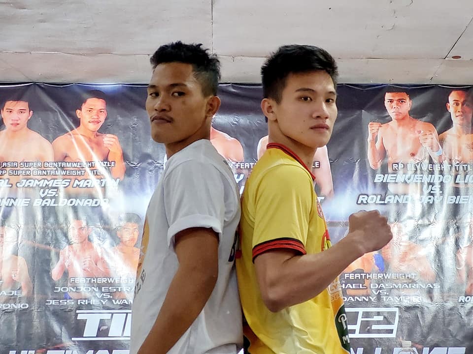 Carl Jammes Martin (right) and Ronnie Baldonado (left) pose after the official weigh-in for their regional title duel on Saturday, March 12 in Parañaque City. | Photo from Martin's Facebook Page.