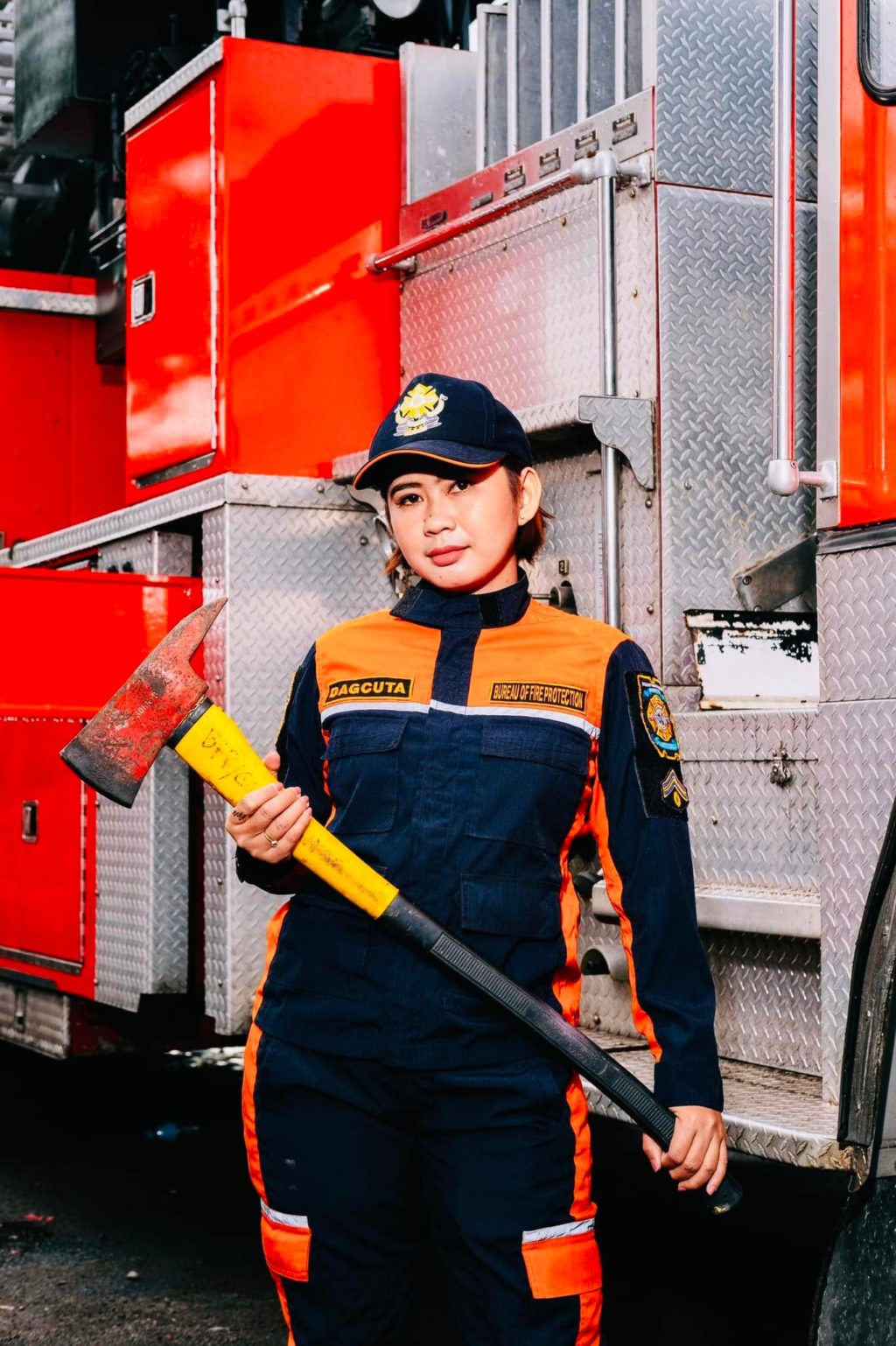 WOMAN FIREFIGHTER OF CCFO. FO1 Novie Dagcuta, woman firefighter of the CCFO, says that she has learned to love the job as a firefighter, embracing its risks and challenges. Photo courtesy of BFP R7 Cebu City Fire Office Facebook page (file photo)