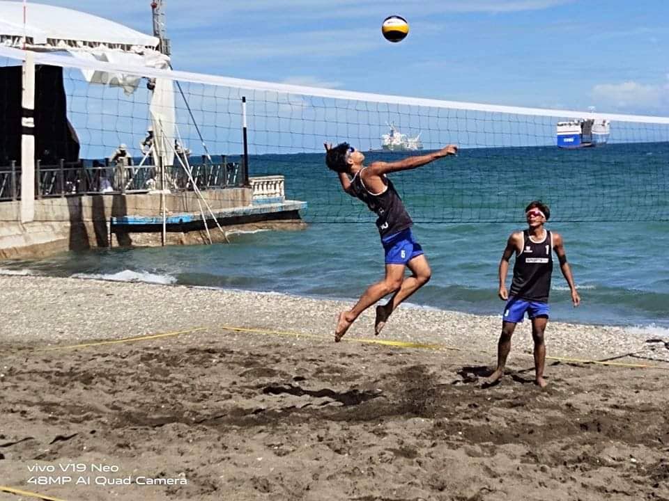 VARGAS, GABITO WIN. Asian Volleyballistas during the men's championship action of the 77th American Landing Anniversary Beach Volleyball Tournament in Talisay City. | Contributed Photo