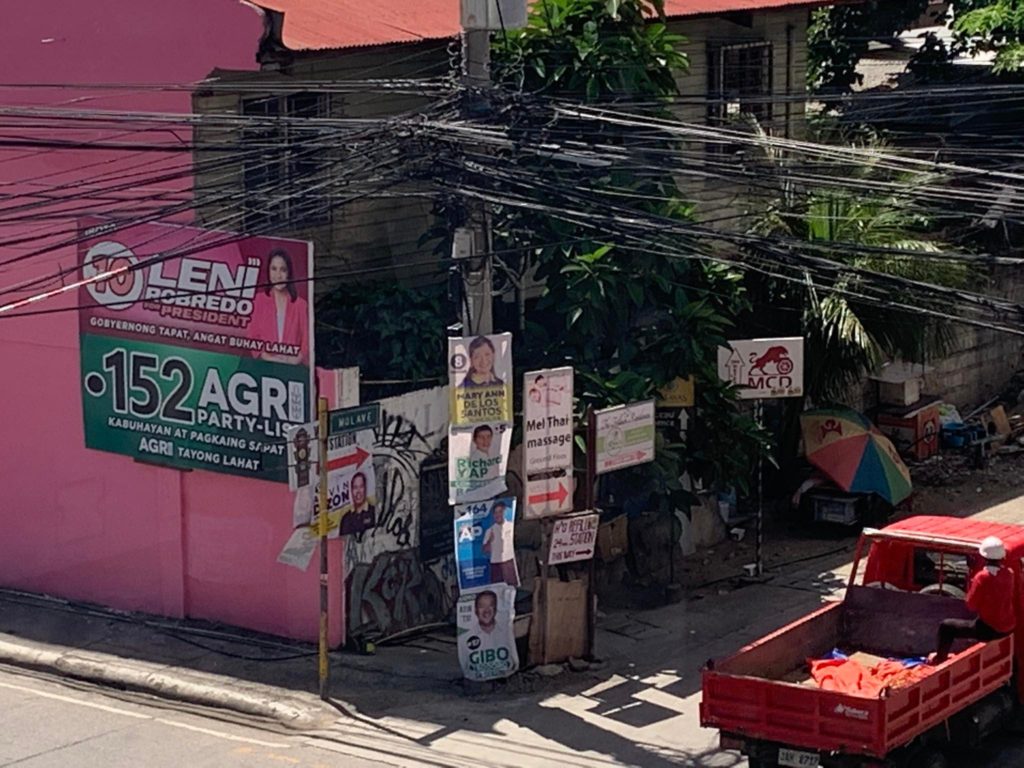 Campaign posters hang on an electric post along Escario Street in Cebu City.