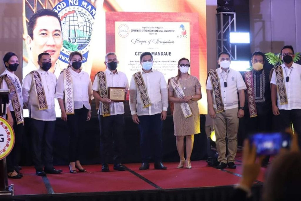 Mandaue City Mayor Jonas Cortes received a plaque for Best Performing CADAC in Central Visayas.
