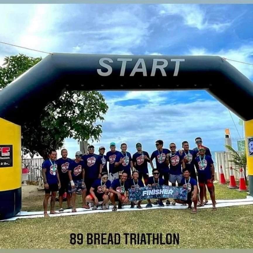 Members of the Bread Warriors Triathlon Team pose for a group photo after their successful maiden triathlon event dubbed as "89 Bread Triathlon," on April 2, 2022. | Contributed Photo