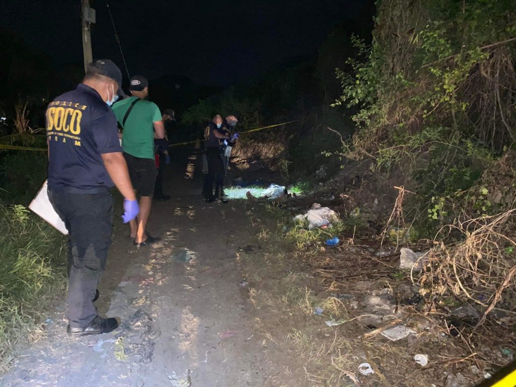 Cebu City Police Office SOCO process the area in Barangay Tisa, Cebu City where the alleged shootout between a drug suspect happened resulting to the death of the suspect.
