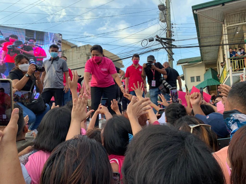 Vice President Leni Robredo, who is running for president, greets supporters at the city hall in Danao City in northern Cebu where a mini-rally for the Leni-Kiko tandem was held today, April 21, during the tandem's campaign caravan in the north of Cebu. | Morexette Erram