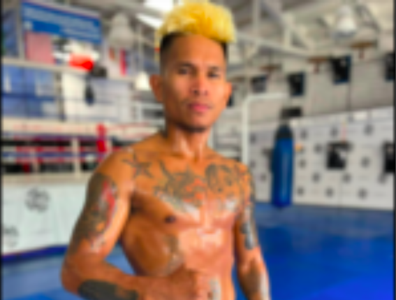 WBO Champion John Riel "Quadro Alas" posts photos showing his ripped self as his answer to Probellum's photos of his challenger Paul Butler. |