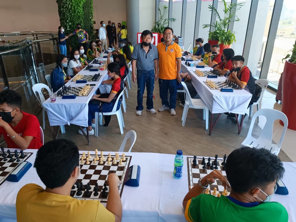 CESAFI CHESS. FA Lincoln Yap (left) and Ed Velarde (right) pose for a photo during the Cesafi chess tournament at the Robinsons Galleria Cebu on Sunday, May 1, 2022. | Glendale G. Rosal