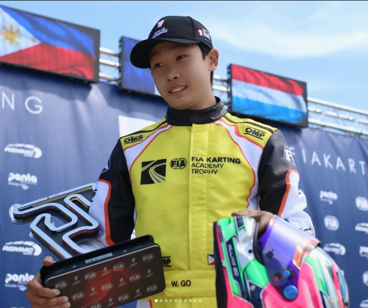 Cebuano karting sensation William Riley Go receives his trophy for finishing second place during the 2022 FIA Karting Academy Trophy in Genk, Belgium awarding ceremonies. | Photo from Go's Instagram page.