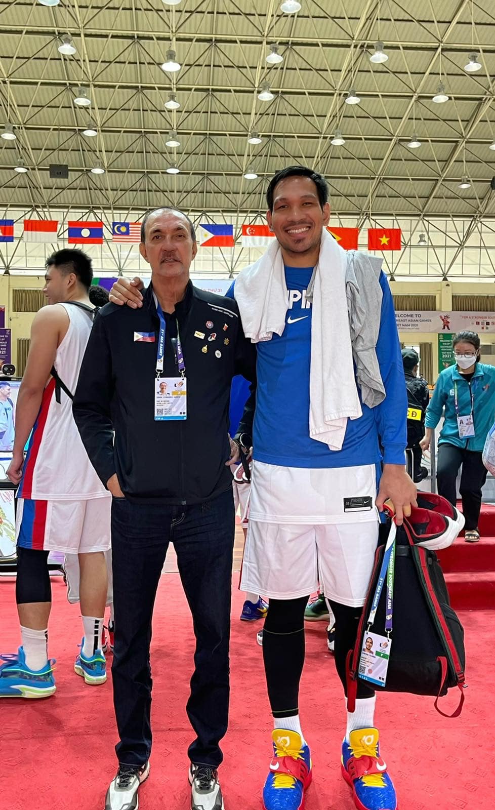 PSC Commissioner and chef de mission Ramon Fernandez poses with PBA star and Gilas player Junmar Fajardo in the 31st SEA Games in Vietnam. | Photo from Fernandez's Facebook page.