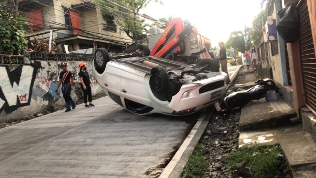 A car rolled over during an accident in Barangay Sambag in Cebu City on May 29.