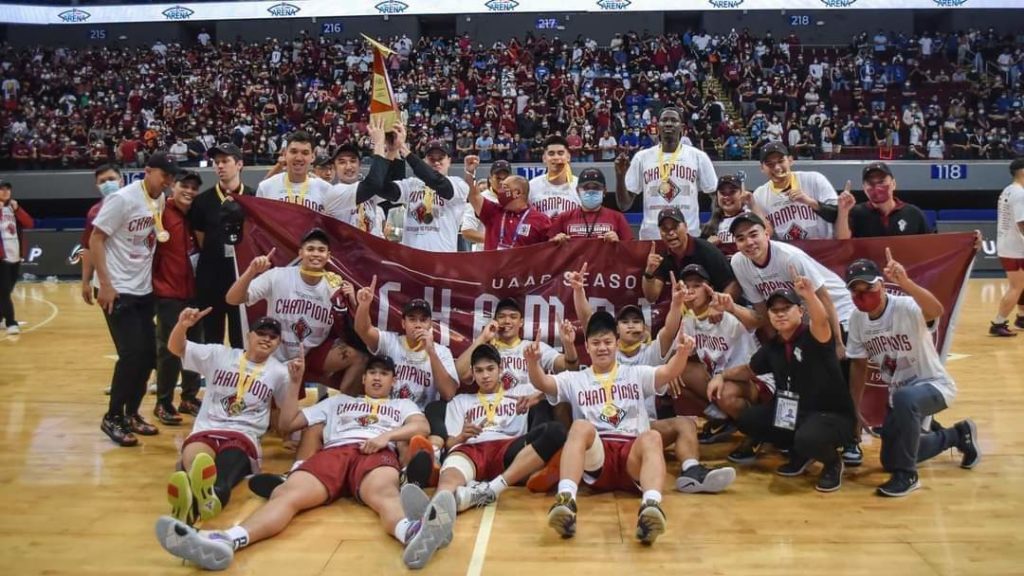 The UP Fighting Maroons basketball team celebrates after beating Ateneo Blue Eagles to win the UAAP basketball title after 47 years. | Dennis Gorecho