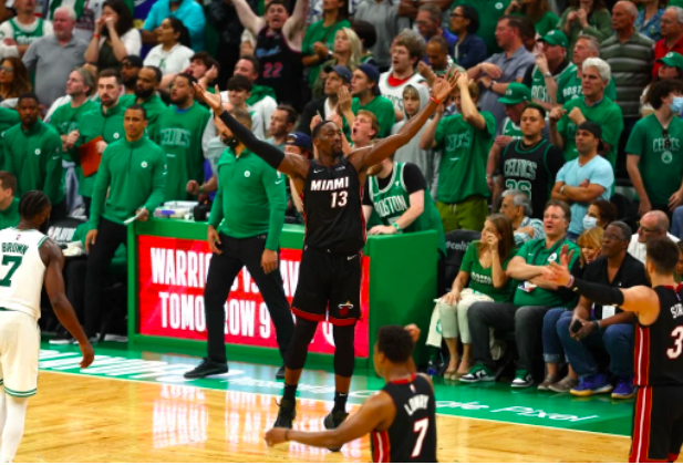  Bam Adebayo #13 of the Miami Heat reacts after a basket in the fourth quarter against the Boston Celtics in Game Three of the 2022 NBA Playoffs Eastern Conference Finals at TD Garden on May 21, 2022 in Boston, Massachusetts. Elsa/Getty Images/AFP