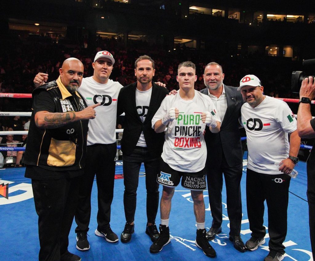 Oscar Duarte (middle) takes time for a photo opportunity with his trainers and promoters after defeating Mark Bernaldez of the Philippines in Anaheim, California. | Photo from Duarte's Facebook page.