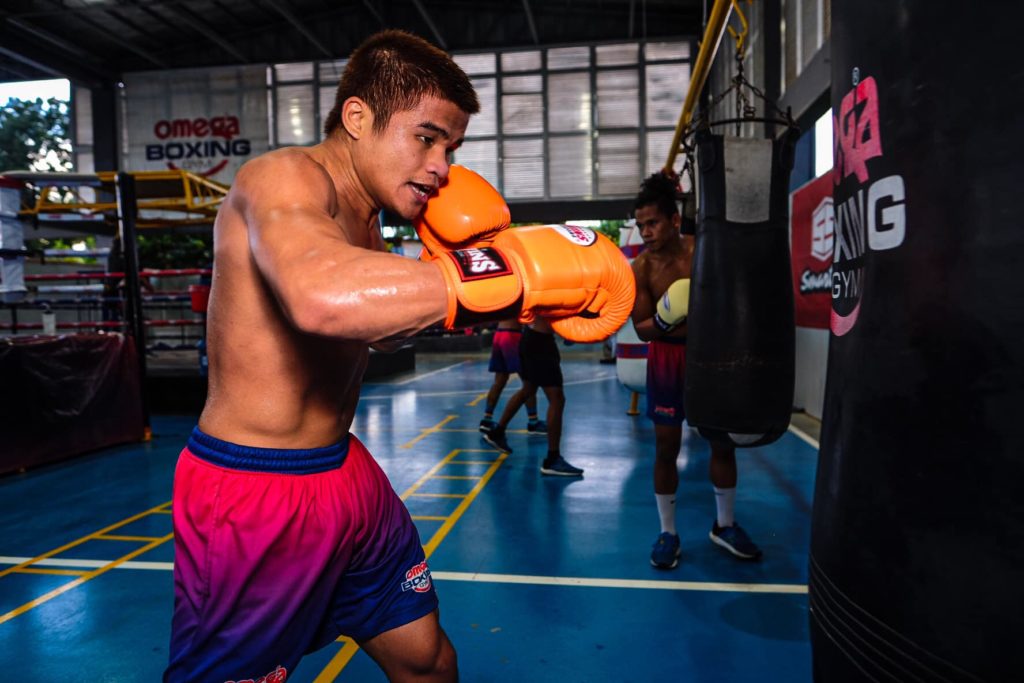 Pete Apolinar hits the bag at the Omega Boxing Gym in Mandaue City. | Photo from Omega Boxing Gym Facebook page.