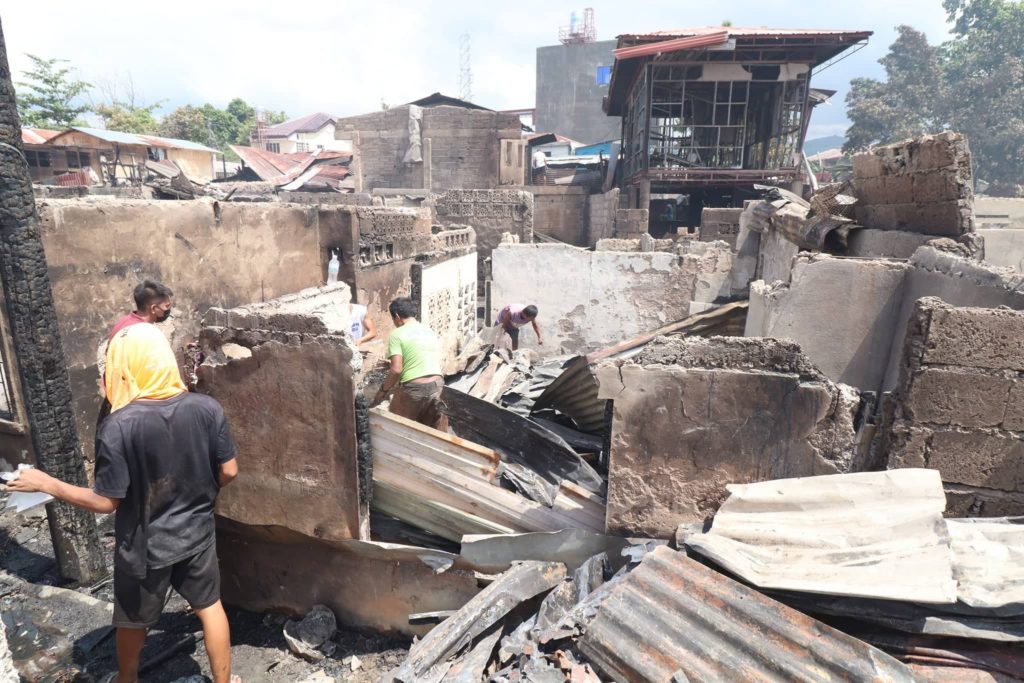 Arson case readied for individuals linked to Punta fire. In photo are residents salvaging whatever materials they can get from what remains of their razed houses a day after the June 11, 2022 Punta Princesa fire in Cebu City. | Photo Courtesy of Cebu City PIO