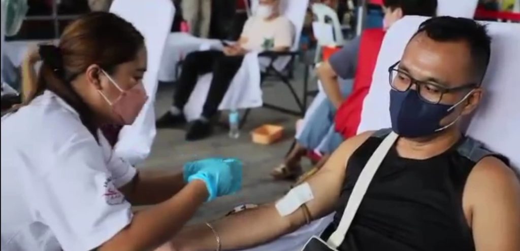 A volunteer extracts blood during a bloodletting activity in Lapu-Lapu on June 17, 2022 at the Hoops Dome in Barangay Gun-ob, this city. | Futch Anthony Inso