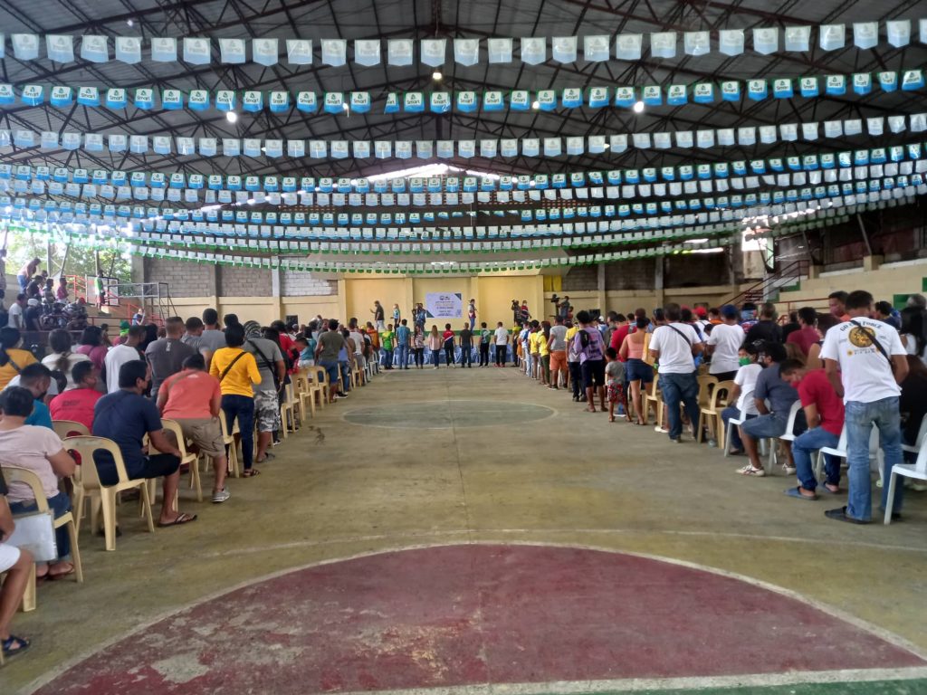 Some 957 legitimate tricycle drivers receive their P5,000 fuel subsidy today from the Mandaue City government at the San Roque Parish Gym in Barangay Subangdaku. | Mary Rose Sagarino
