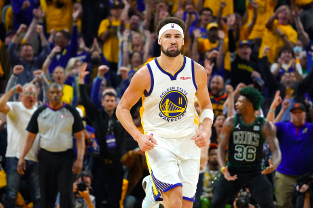 Golden State Warriors guard Klay Thompson (11) reacts after making a three-point basket during the second half in game five of the 2022 NBA Finals against the Boston Celtics at Chase Center. Mandatory Credit: Kyle Terada-USA TODAY Sports