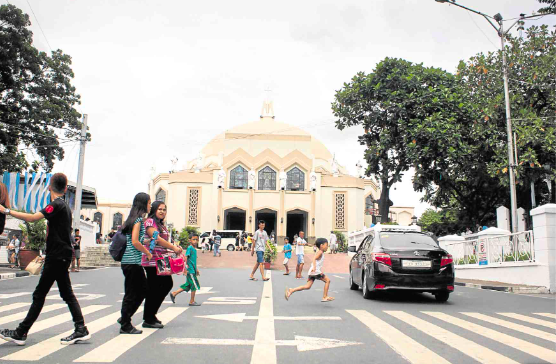 The Shrine of the Our Lady of Peace and Good Voyage, or the Antipolo Cathedral, attracts pilgrims and devotees year-round. —CLIFFORD NUÑEZ