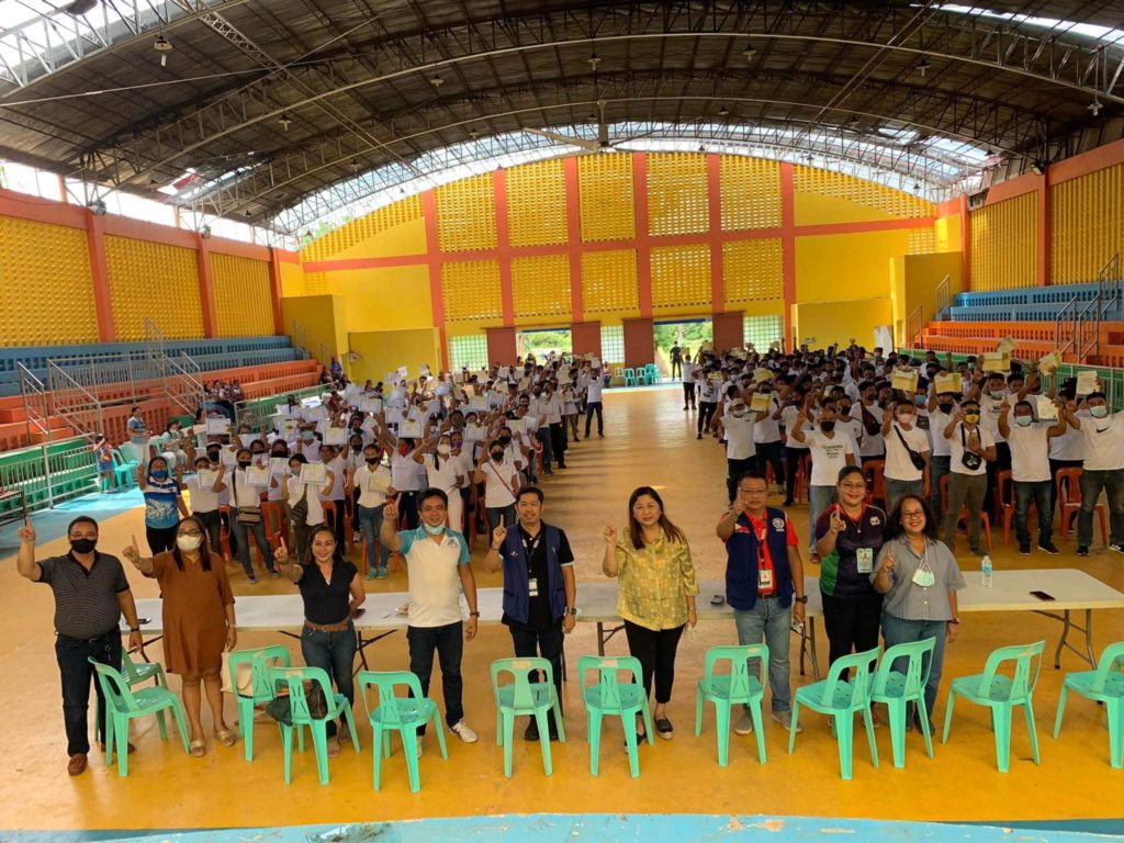 OLANGO ISLAND RESIDENTS GRADUATE FROM FREE SKILLS TRAININGS. The officials of the Lapu-Lapu City government and TESDA are present at the graduation of the 255 skills training graduates of Olango Island. | Contributed photo