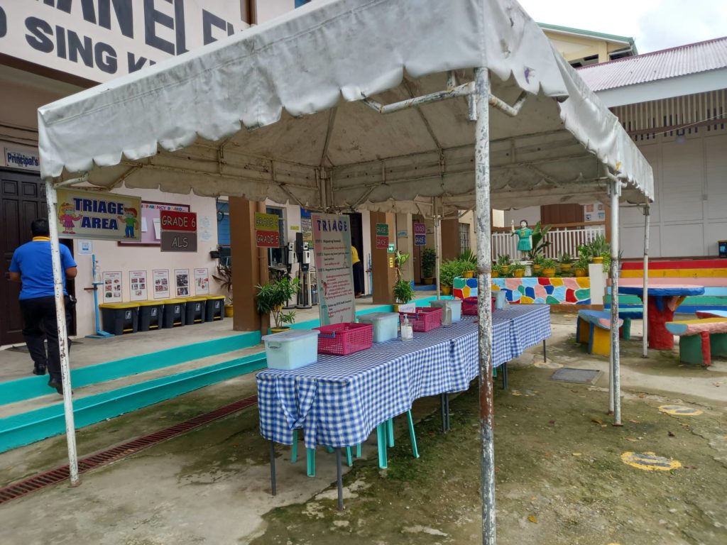 Teachers of Canduman Elementary School in Barangay Canduman, Mandaue City get ready for the coming July 25 start of enrolment for the coming school year. | Mary Rose Sagarino
