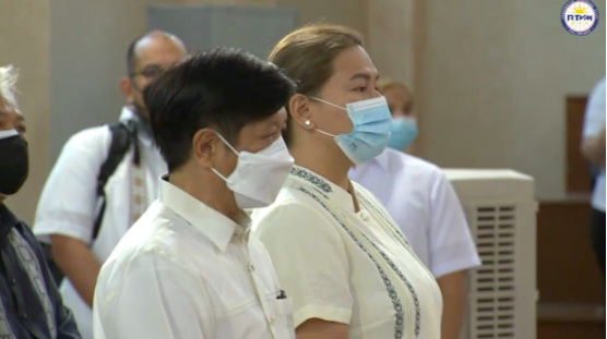 President Ferdinand “Bongbong” Marcos Jr. and Vice President Sara Duterte attend a mass on the first day of their term. Screengrab from RTVM / Facebook