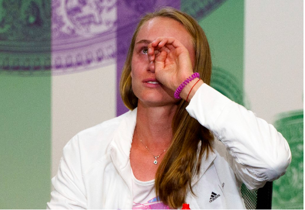 Kazakhstan’s Elena Rybakina cries as she gives a press conference in the Main Interview Room after winning against Tunisia’s Ons Jabeur in their women’s singles final tennis match on the thirteenth day of the 2022 Wimbledon Championships at The All England Tennis Club in Wimbledon, southwest London, on July 9, 2022. (Photo by Joe TOTH / various sources / AFP)