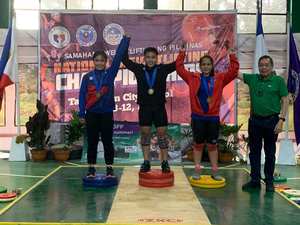 Cebuano weightlifters bag 4 golds in Tagbilaran nat’l championships: In photo is Elreen Ann Ando (middle) leading Cebuano weightlifters in winning four gold medals in the Weightlifting National Championships in Tagbilaran, Bohol. | Photo from Ramon Solis of SWP