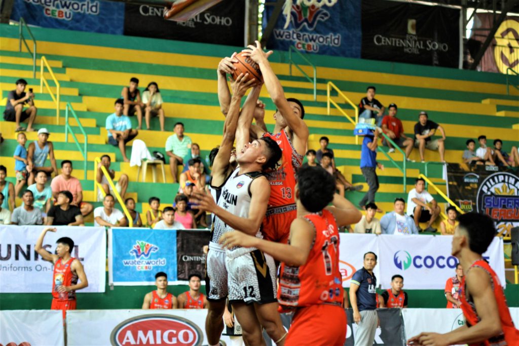 Players from Bukidnon and Mandaue battle for a rebound during their PSL 21-U VisMin leg game at the Cebu City Sports Institute on Sunday, August 21, 2022. | Photo from PSL Media Bureau
