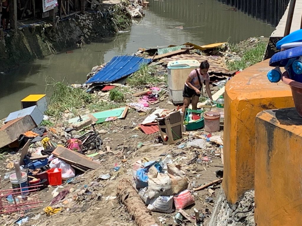 Affected families of the citywide clearing operations in the three-meter easement of the city's waterways particularly in the Kinalumsan River are temporarily housed in the San Nicolas Elementary School. | Morexette Marie B. Erram