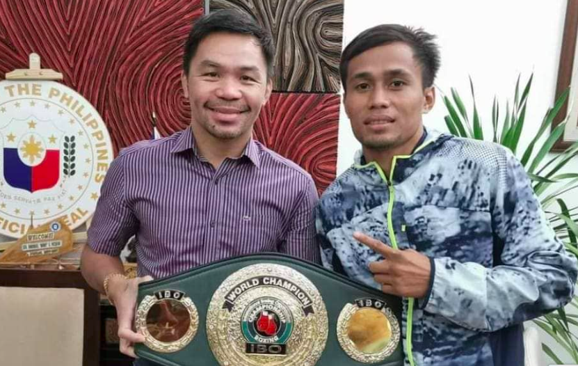 Dave Apolinario (right) makes a courtesy call to Senator Manny Pacquiao (left). | Photo from Sanman Boxing Gym’s Facebook page
