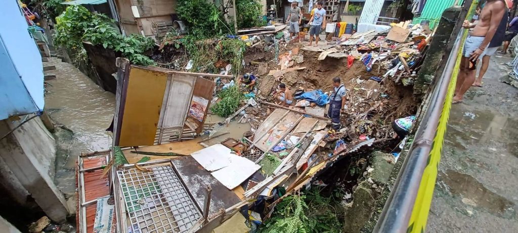 A portion of a house falls into the river in Purok 5, Barangay Kamputhaw, Cebu City. The incident happened after the heavy downpour early this afternoon, August 13. | 