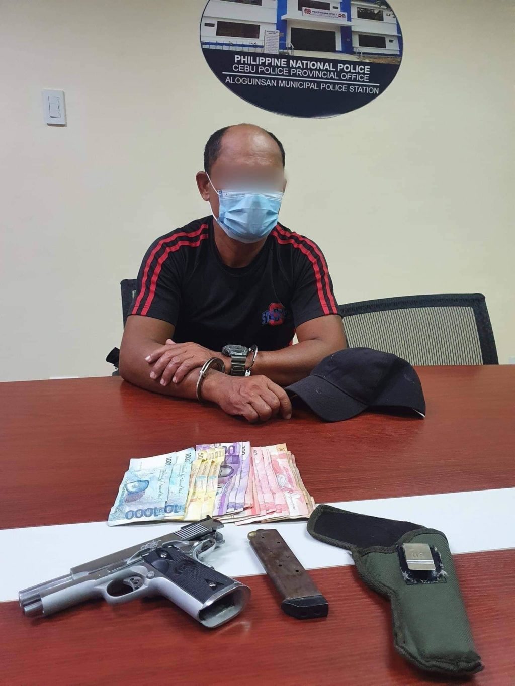 Robbery suspect Reynante Sarquilla for story:Security guard jailed for robbing gas station in Aloguinsan, Cebu